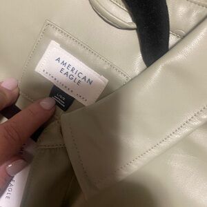 Size large leather American eagles top, never worn, open to offers.